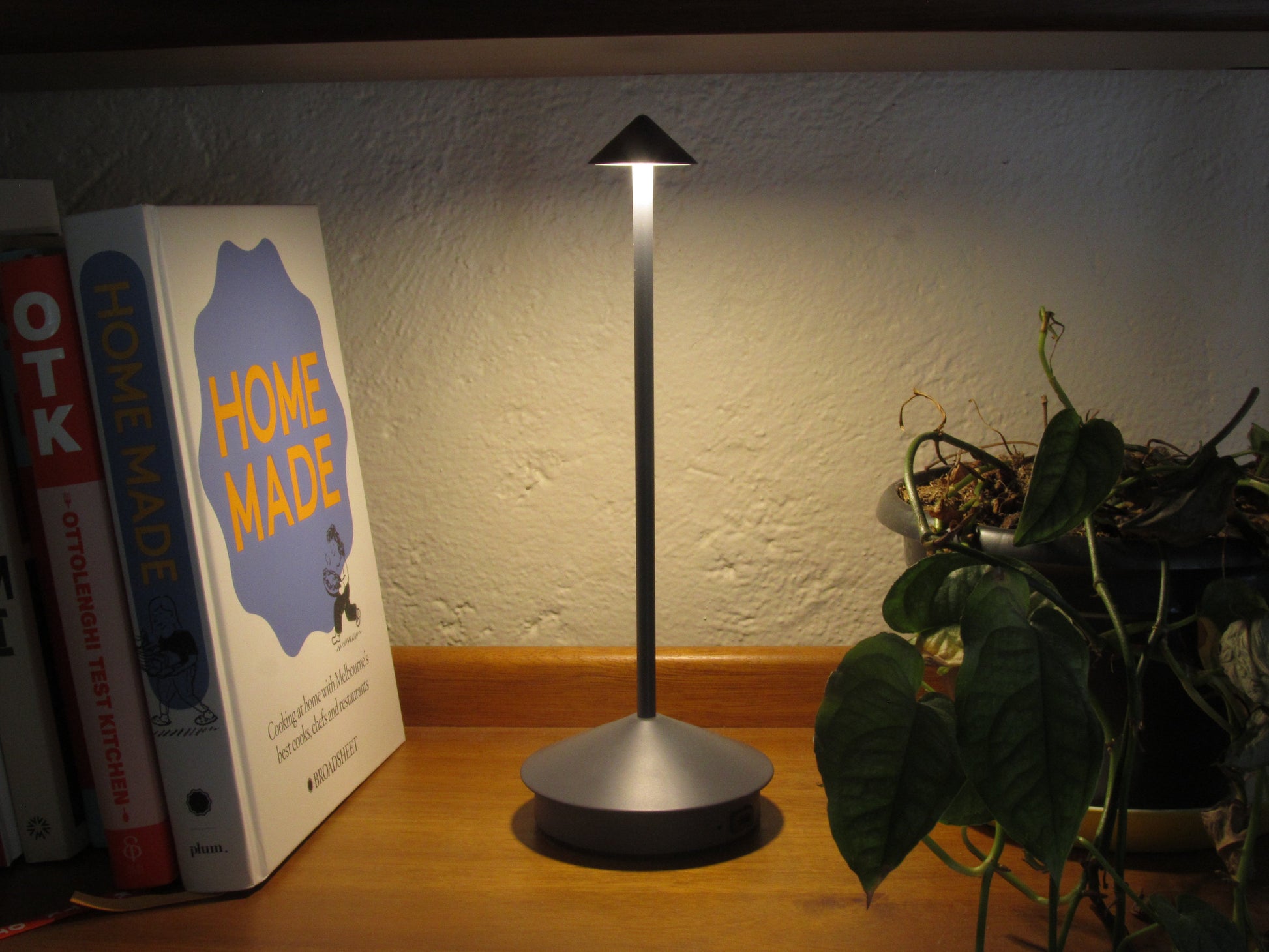 ArcGlow | Modern LED Night Light – Adjustable Brightness with Sleek Arrow-Inspired Form